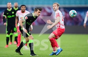 2021-05-16 - Maximilian Philipp of Wolfsburg and Konrad Laimer of Leipzig during the German championship Bundesliga football match between RB Leipzig and VfL Wolfsburg on May 16, 2021 at Red Bull Arena in Leipzig, Germany - Photo Valeria Witters / Witters / firo Sportphoto / DPPI - RB LEIPZIG VS VFL WOLFSBURG - GERMAN BUNDESLIGA - SOCCER