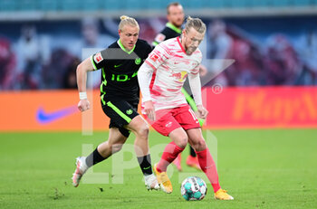 2021-05-16 - Emil Forsberg of Leipzig and Xaver Schlager of Wolfsburg during the German championship Bundesliga football match between RB Leipzig and VfL Wolfsburg on May 16, 2021 at Red Bull Arena in Leipzig, Germany - Photo Valeria Witters / Witters / firo Sportphoto / DPPI - RB LEIPZIG VS VFL WOLFSBURG - GERMAN BUNDESLIGA - SOCCER