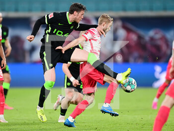 2021-05-16 - Konrad Laimer of Leipzig and Wout Weghorst of Wolfsburg during the German championship Bundesliga football match between RB Leipzig and VfL Wolfsburg on May 16, 2021 at Red Bull Arena in Leipzig, Germany - Photo Valeria Witters / Witters / firo Sportphoto / DPPI - RB LEIPZIG VS VFL WOLFSBURG - GERMAN BUNDESLIGA - SOCCER