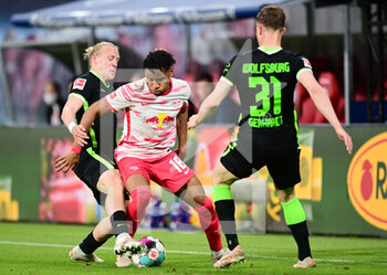 2021-05-16 - Christopher Nkunku of Leipzig and Xaver Schlager, Yannick Gerhardt of Leipzig during the German championship Bundesliga football match between RB Leipzig and VfL Wolfsburg on May 16, 2021 at Red Bull Arena in Leipzig, Germany - Photo Valeria Witters / Witters / firo Sportphoto / DPPI - RB LEIPZIG VS VFL WOLFSBURG - GERMAN BUNDESLIGA - SOCCER