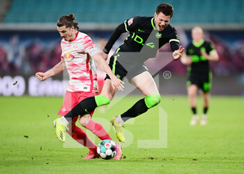 2021-05-16 - Marcel Sabitzer of Leipzig and Wout Weghorst of Wolfsburg during the German championship Bundesliga football match between RB Leipzig and VfL Wolfsburg on May 16, 2021 at Red Bull Arena in Leipzig, Germany - Photo Valeria Witters / Witters / firo Sportphoto / DPPI - RB LEIPZIG VS VFL WOLFSBURG - GERMAN BUNDESLIGA - SOCCER