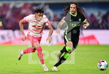 2021-05-16 - Christopher Nkunku of Leipzig and Kevin Mbabu of Wolfsburg during the German championship Bundesliga football match between RB Leipzig and VfL Wolfsburg on May 16, 2021 at Red Bull Arena in Leipzig, Germany - Photo Valeria Witters / Witters / firo Sportphoto / DPPI - RB LEIPZIG VS VFL WOLFSBURG - GERMAN BUNDESLIGA - SOCCER