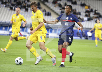 2020-10-07 - Ilya Zabarnyi of Ukraine, Anthony Martial of France during the Friendly Game football match between France and Ukraine on October 7, 2020 at Stade de France in Saint-Denis, France - Photo Jean Catuffe / DPPI - FRANCE VS UKRAINE - FRIENDLY MATCH - SOCCER