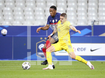 2020-10-07 - Vitaliy Mykolenko of Ukraine, Anthony Martial of France during the Friendly Game football match between France and Ukraine on October 7, 2020 at Stade de France in Saint-Denis, France - Photo Jean Catuffe / DPPI - FRANCE VS UKRAINE - FRIENDLY MATCH - SOCCER