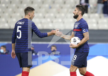 2020-10-07 - Olivier Giroud of France celebrates his goal with Clement Lenglet (left) during the Friendly Game football match between France and Ukraine on October 7, 2020 at Stade de France in Saint-Denis, France - Photo Jean Catuffe / DPPI - FRANCE VS UKRAINE - FRIENDLY MATCH - SOCCER