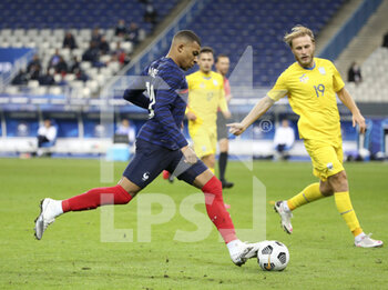 2020-10-07 - Kylian Mbappe of France, Roman Bezus of Ukraine during the Friendly Game football match between France and Ukraine on October 7, 2020 at Stade de France in Saint-Denis, France - Photo Jean Catuffe / DPPI - FRANCE VS UKRAINE - FRIENDLY MATCH - SOCCER