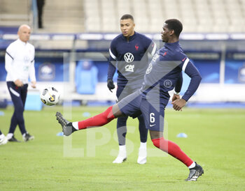2020-10-07 - Paul Pogba, Kylian Mbappe of France warm up before the Friendly Game football match between France and Ukraine on October 7, 2020 at Stade de France in Saint-Denis, France - Photo Jean Catuffe / DPPI - FRIENDLY GAME FOOTBALL MATCH BETWEEN FRANCE AND UKRAINE - FRIENDLY MATCH - SOCCER