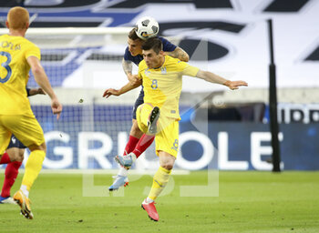 2020-10-07 - Ruslan Malinovskyi of Ukraine, Lucas Digne of France during the Friendly Game football match between France and Ukraine on October 7, 2020 at Stade de France in Saint-Denis, France - Photo Jean Catuffe / DPPI - FRIENDLY GAME FOOTBALL MATCH BETWEEN FRANCE AND UKRAINE - FRIENDLY MATCH - SOCCER