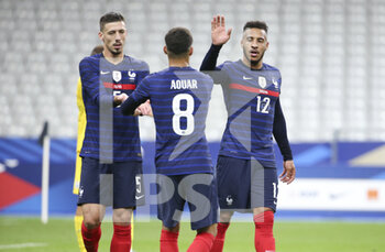 2020-10-07 - Corentin Tolisso of France (right) celebrates his goal with Clement Lenglet, Houssem Aouar during the international friendly game football match between France and Ukraine on October 7, 2020 at Stade de France in Saint-Denis, France - Photo Jean Catuffe / DPPI - FRIENDLY GAME FOOTBALL MATCH BETWEEN FRANCE AND UKRAINE - FRIENDLY MATCH - SOCCER