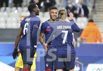 2020-10-07 - Corentin Tolisso of France (right) celebrates his goal with Paul Pogba, Antoine Griezmann during the international friendly game football match between France and Ukraine on October 7, 2020 at Stade de France in Saint-Denis, France - Photo Jean Catuffe / DPPI - FRIENDLY GAME FOOTBALL MATCH BETWEEN FRANCE AND UKRAINE - FRIENDLY MATCH - SOCCER