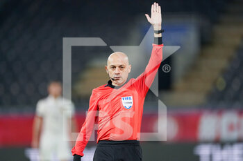 2021-03-24 - Referee Cuneyt Cakir during the FIFA World Cup 2022, Qualifiers Group E football match between Belgium and Wales on March 24, 2021 at King Power at Den Dreef Stadion in Leuven, Belgium - Photo Jeroen Meuwsen / Orange Pictures / DPPI - FIFA WORLD CUP 2020 QUALIFIERS - BELGIUM AND WALES - FIFA WORLD CUP - SOCCER