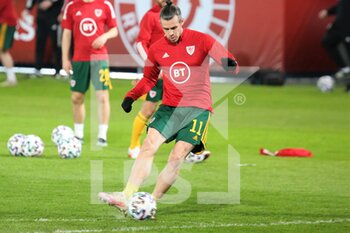 2021-03-24 - Gareth Bale of Wales warms up during the FIFA World Cup 2022, Qualifiers Group E football match between Belgium and Wales on March 24, 2021 at King Power at Den Dreef Stadion in Leuven, Belgium - Photo Laurent Lairys / DPPI - FIFA WORLD CUP 2020 QUALIFIERS - BELGIUM AND WALES - FIFA WORLD CUP - SOCCER