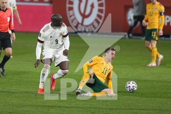 2021-03-24 - Romelu Lukaku of Belgium and Joe Morrell of Wales during the FIFA World Cup 2022, Qualifiers Group E football match between Belgium and Wales on March 24, 2021 at King Power at Den Dreef Stadion in Leuven, Belgium - Photo Laurent Lairys / DPPI - FIFA WORLD CUP 2020 QUALIFIERS - BELGIUM AND WALES - FIFA WORLD CUP - SOCCER