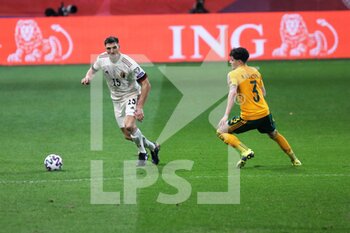2021-03-24 - Thomas Meunier of Belgium and Neco Williams of Wales during the FIFA World Cup 2022, Qualifiers Group E football match between Belgium and Wales on March 24, 2021 at King Power at Den Dreef Stadion in Leuven, Belgium - Photo Laurent Lairys / DPPI - FIFA WORLD CUP 2020 QUALIFIERS - BELGIUM AND WALES - FIFA WORLD CUP - SOCCER