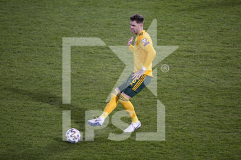 2021-03-24 - Joe Rodon of Wales during the FIFA World Cup 2022, Qualifiers Group E football match between Belgium and Wales on March 24, 2021 at King Power at Den Dreef Stadion in Leuven, Belgium - Photo Jean Catuffe / DPPI - FIFA WORLD CUP 2020 QUALIFIERS - BELGIUM AND WALES - FIFA WORLD CUP - SOCCER