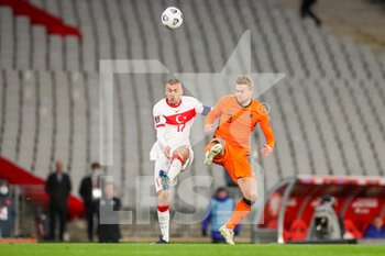 2021-03-24 - Burak Yilmaz of Turkey and Matthijs de Ligt of Netherlands during the FIFA World Cup 2022, Qualifiers, Group G football match between Turkey and Netherlands on March 24, 2021 at Ali Sali Yen Stadium in Istanbul, Turkey - Photo Marcel ter Bals / Orange Pictures / DPPI - WORLD CUP 2020 QUALIFIERS - TURKEY AND NETHERLANDS - FIFA WORLD CUP - SOCCER