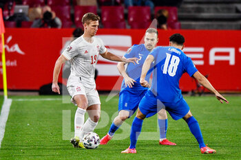 2021-03-25 - Dani Olmo of Spain, Michalis Bakakis and Dimitris Limnios of Greece during the 2022 FIFA World Cup, Qualifiers, Group B football match between Spain and Greece on March 25, 2021 at Estadio Municipal Nuevo Los Carmenes in Granada, Spain - Photo Pablo Morano / Orange Pictures / DPPI - 2022 FIFA WORLD CUP, QUALIFIERS, GROUP B - SPAIN AND GREECE - FIFA WORLD CUP - SOCCER