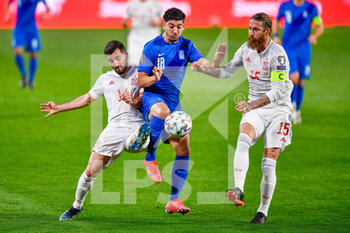 2021-03-25 - Rodri of Spain, Dimitris Limnios of Greece and Sergio Ramos of Spain during the 2022 FIFA World Cup, Qualifiers, Group B football match between Spain and Greece on March 25, 2021 at Estadio Municipal Nuevo Los Carmenes in Granada, Spain - Photo Pablo Morano / Orange Pictures / DPPI - 2022 FIFA WORLD CUP, QUALIFIERS, GROUP B - SPAIN AND GREECE - FIFA WORLD CUP - SOCCER