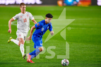 2021-03-25 - Dimitris Limnios of Greece and Dani Olmo of Spain during the 2022 FIFA World Cup, Qualifiers, Group B football match between Spain and Greece on March 25, 2021 at Estadio Municipal Nuevo Los Carmenes in Granada, Spain - Photo Pablo Morano / Orange Pictures / DPPI - 2022 FIFA WORLD CUP, QUALIFIERS, GROUP B - SPAIN AND GREECE - FIFA WORLD CUP - SOCCER