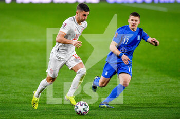 2021-03-25 - Ferran Torres of Spain and Christos Tzolis of Greece during the 2022 FIFA World Cup, Qualifiers, Group B football match between Spain and Greece on March 25, 2021 at Estadio Municipal Nuevo Los Carmenes in Granada, Spain - Photo Pablo Morano / Orange Pictures / DPPI - 2022 FIFA WORLD CUP, QUALIFIERS, GROUP B - SPAIN AND GREECE - FIFA WORLD CUP - SOCCER