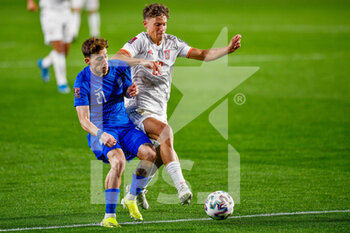 2021-03-25 - Kostas Tsimikas of Greece and Marcos Llorente of Spain during the 2022 FIFA World Cup, Qualifiers, Group B football match between Spain and Greece on March 25, 2021 at Estadio Municipal Nuevo Los Carmenes in Granada, Spain - Photo Pablo Morano / Orange Pictures / DPPI - 2022 FIFA WORLD CUP, QUALIFIERS, GROUP B - SPAIN AND GREECE - FIFA WORLD CUP - SOCCER