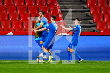 2021-03-25 - Tasos Bakasetas of Greece celebrates his goal during the 2022 FIFA World Cup, Qualifiers, Group B football match between Spain and Greece on March 25, 2021 at Estadio Municipal Nuevo Los Carmenes in Granada, Spain - Photo Pablo Morano / Orange Pictures / DPPI - 2022 FIFA WORLD CUP, QUALIFIERS, GROUP B - SPAIN AND GREECE - FIFA WORLD CUP - SOCCER