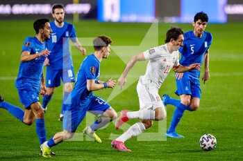 2021-03-25 - Kostas Tsimikas of Greece, Mikel Oyarzabal of Spain and Andreas Bouchalakis of Greece during the 2022 FIFA World Cup, Qualifiers, Group B football match between Spain and Greece on March 25, 2021 at Estadio Municipal Nuevo Los Carmenes in Granada, Spain - Photo Pablo Morano / Orange Pictures / DPPI - 2022 FIFA WORLD CUP, QUALIFIERS, GROUP B - SPAIN AND GREECE - FIFA WORLD CUP - SOCCER