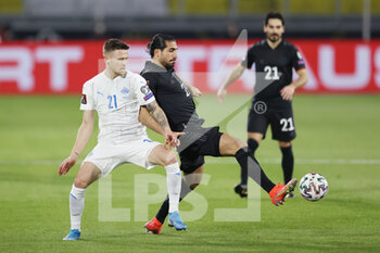 25/03/2021 - Emre Can of Germany and Arnor Ingvi Traustason of Iceland during the 2022 FIFA World Cup, Qualifiers, Group J football match between Germany and Iceland on March 25, 2021 at the Schauinsland-Reisen-Arena in Duisburg, Germany - Photo Jurgen Fromme / firo Sportphoto / DPPI - 2022 FIFA WORLD CUP, QUALIFIERS, GROUP J - GERMANY AND ICELAND - FIFA MONDIALI - CALCIO