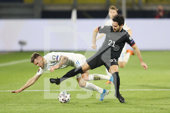 25/03/2021 - Arnor Ingvi Traustason of Iceland and Ilkay Gundogan of Germany during the 2022 FIFA World Cup, Qualifiers, Group J football match between Germany and Iceland on March 25, 2021 at the Schauinsland-Reisen-Arena in Duisburg, Germany - Photo Jurgen Fromme / firo Sportphoto / DPPI - 2022 FIFA WORLD CUP, QUALIFIERS, GROUP J - GERMANY AND ICELAND - FIFA MONDIALI - CALCIO