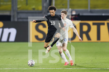 25/03/2021 - Leroy Sane of Germany and Jon Dadi Bodvarsson of Iceland during the 2022 FIFA World Cup, Qualifiers, Group J football match between Germany and Iceland on March 25, 2021 at the Schauinsland-Reisen-Arena in Duisburg, Germany - Photo Jurgen Fromme / firo Sportphoto / DPPI - 2022 FIFA WORLD CUP, QUALIFIERS, GROUP J - GERMANY AND ICELAND - FIFA MONDIALI - CALCIO