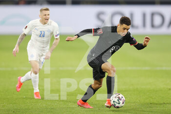 25/03/2021 - Jamal Musiala of Germany and Victor Palsson of Iceland during the 2022 FIFA World Cup, Qualifiers, Group J football match between Germany and Iceland on March 25, 2021 at the Schauinsland-Reisen-Arena in Duisburg, Germany - Photo Jurgen Fromme / firo Sportphoto / DPPI - 2022 FIFA WORLD CUP, QUALIFIERS, GROUP J - GERMANY AND ICELAND - FIFA MONDIALI - CALCIO