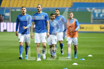 2021-03-25 - Lorenzo Pellegrini, Leonardo Bonucci, Lorenzo Insigne and Marco Verratti of Italy warm up during the FIFA World Cup 2022, Qualifiers Group C football match between Italy and Northern Ireland on March 25, 2021 at Ennio Tardini stadium in Parma, Italy - Photo Laurent Lairys / DPPI - FIFA WORLD CUP 2022, QUALIFIERS GROUP C - ITALY VS NORTHERN IRELAND - FIFA WORLD CUP - SOCCER