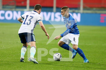 2021-03-25 - Marco Verratti of Italy and Corry Evans of Northern Ireland during the FIFA World Cup 2022, Qualifiers Group C football match between Italy and Northern Ireland on March 25, 2021 at Ennio Tardini stadium in Parma, Italy - Photo Laurent Lairys / DPPI - FIFA WORLD CUP 2022, QUALIFIERS GROUP C - ITALY VS NORTHERN IRELAND - FIFA WORLD CUP - SOCCER