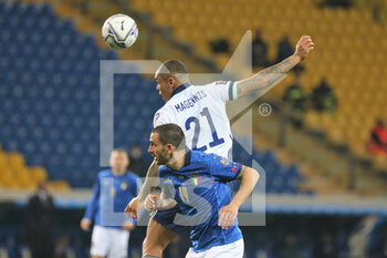 2021-03-25 - Leonardo Bonucci of Italy and Josh Magennis of Northern Ireland during the FIFA World Cup 2022, Qualifiers Group C football match between Italy and Northern Ireland on March 25, 2021 at Ennio Tardini stadium in Parma, Italy - Photo Laurent Lairys / DPPI - FIFA WORLD CUP 2022, QUALIFIERS GROUP C - ITALY VS NORTHERN IRELAND - FIFA WORLD CUP - SOCCER