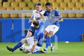 2021-03-25 - Michael Smith of Northern Ireland and Giorgio Chiellini, Emerson of Italy during the FIFA World Cup 2022, Qualifiers Group C football match between Italy and Northern Ireland on March 25, 2021 at Ennio Tardini stadium in Parma, Italy - Photo Laurent Lairys / DPPI - FIFA WORLD CUP 2022, QUALIFIERS GROUP C - ITALY VS NORTHERN IRELAND - FIFA WORLD CUP - SOCCER