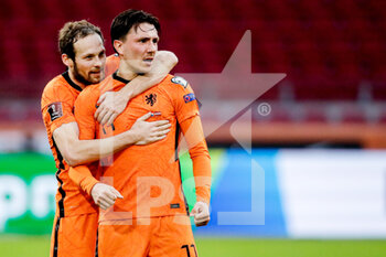 2021-03-27 - Steven Berghuis of the Netherlands celebrating the first goal of his side with Daley Blind during the 2022 FIFA World Cup, Qualifiers, Group G football match between Netherlands and Latvia on March 27, 2021 at Johan Cruijff ArenA in Amsterdam, Netherlands - Photo Broer van den Boom / Orange Pictures / DPPI - QUALIFICAZIONI AI MONDIALI FIFA 2022 - GRUPPO G - PAESI BASSI VS LETTONIA - FIFA WORLD CUP - SOCCER