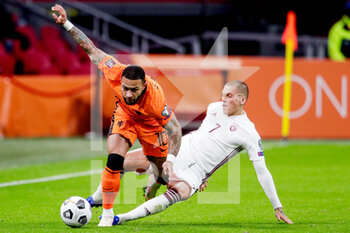 2021-03-27 - Memphis Depay of the Netherlands, Vladimirs Kamess of Latvia during the 2022 FIFA World Cup, Qualifiers, Group G football match between Netherlands and Latvia on March 27, 2021 at Johan Cruijff ArenA in Amsterdam, Netherlands - Photo Broer van den Boom / Orange Pictures / DPPI - QUALIFICAZIONI AI MONDIALI FIFA 2022 - GRUPPO G - PAESI BASSI VS LETTONIA - FIFA WORLD CUP - SOCCER