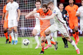 2021-03-27 - Daley Blind of the Netherlands, Vladislavs Gutkovskis of Latvia during the 2022 FIFA World Cup, Qualifiers, Group G football match between Netherlands and Latvia on March 27, 2021 at Johan Cruijff ArenA in Amsterdam, Netherlands - Photo Broer van den Boom / Orange Pictures / DPPI - QUALIFICAZIONI AI MONDIALI FIFA 2022 - GRUPPO G - PAESI BASSI VS LETTONIA - FIFA WORLD CUP - SOCCER