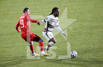 2021-03-30 - Renato Sanches of Portugal, Danel Sinani of Luxembourg (left) during the 2022 FIFA World Cup, Qualifiers, Group A football match between Luxembourg and Portugal on March 30, 2021 at Josy Barthel in Luxembourg, Luxembourg - Photo Jean Catuffe / DPPI - MONDIALI FIFA 2022, QUALIFICAZIONI, GRUPPO A - LUSSEMBURGO VS PORTOGALLO - FIFA WORLD CUP - SOCCER
