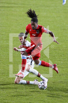 2021-03-30 - Gerson Rodrigues of Luxembourg, Jose Fonte of Portugal during the 2022 FIFA World Cup, Qualifiers, Group A football match between Luxembourg and Portugal on March 30, 2021 at Josy Barthel in Luxembourg, Luxembourg - Photo Jean Catuffe / DPPI - MONDIALI FIFA 2022, QUALIFICAZIONI, GRUPPO A - LUSSEMBURGO VS PORTOGALLO - FIFA WORLD CUP - SOCCER
