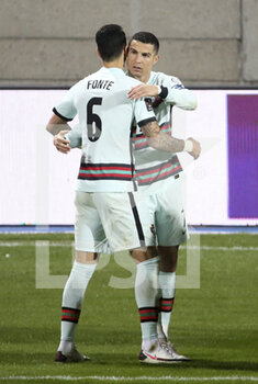 2021-03-30 - Cristiano Ronaldo of Portugal celebrates his goal with Jose Fonte of Portugal during the 2022 FIFA World Cup, Qualifiers, Group A football match between Luxembourg and Portugal on March 30, 2021 at Josy Barthel in Luxembourg, Luxembourg - Photo Jean Catuffe / DPPI - MONDIALI FIFA 2022, QUALIFICAZIONI, GRUPPO A - LUSSEMBURGO VS PORTOGALLO - FIFA WORLD CUP - SOCCER