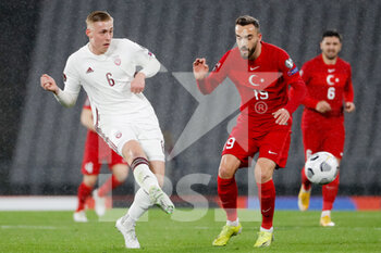 2021-03-30 - Kristers Tobers of Latvia and Kenan Karaman of Turkey during the 2022 FIFA World Cup, Qualifiers, Group G football match between Turkey and Latvia on March 30, 2021 at Ataturk Olympic Stadium in Istanbul, Turkey - Photo Orange Pictures / DPPI - MONDIALI FIFA 2022, QUALIFICAZIONI, GRUPPO G - TURCHIA VS LETTONIA - FIFA WORLD CUP - SOCCER