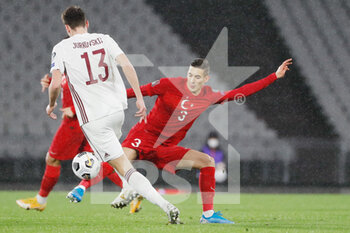 2021-03-30 - Raivis Jurkovskis of Latvia and Mert Muldur of Turkey during the 2022 FIFA World Cup, Qualifiers, Group G football match between Turkey and Latvia on March 30, 2021 at Ataturk Olympic Stadium in Istanbul, Turkey - Photo Orange Pictures / DPPI - MONDIALI FIFA 2022, QUALIFICAZIONI, GRUPPO G - TURCHIA VS LETTONIA - FIFA WORLD CUP - SOCCER