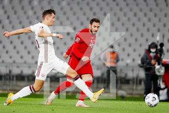 2021-03-30 - Vladislavs Fjodorovs of Latvia and Hakan Calhanoglu of Turkey during the 2022 FIFA World Cup, Qualifiers, Group G football match between Turkey and Latvia on March 30, 2021 at Ataturk Olympic Stadium in Istanbul, Turkey - Photo Orange Pictures / DPPI - MONDIALI FIFA 2022, QUALIFICAZIONI, GRUPPO G - TURCHIA VS LETTONIA - FIFA WORLD CUP - SOCCER