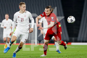 2021-03-30 - Raimonds Krollis of Latvia and Caglar Soyuncu of Turkey during the 2022 FIFA World Cup, Qualifiers, Group G football match between Turkey and Latvia on March 30, 2021 at Ataturk Olympic Stadium in Istanbul, Turkey - Photo Orange Pictures / DPPI - MONDIALI FIFA 2022, QUALIFICAZIONI, GRUPPO G - TURCHIA VS LETTONIA - FIFA WORLD CUP - SOCCER