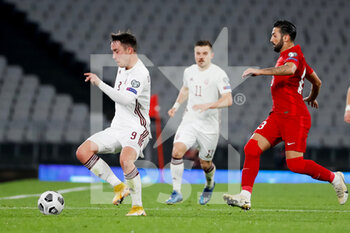 2021-03-30 - Davis Ikaunieks of Latvia and Umut Meras of Turkey during the 2022 FIFA World Cup, Qualifiers, Group G football match between Turkey and Latvia on March 30, 2021 at Ataturk Olympic Stadium in Istanbul, Turkey - Photo Orange Pictures / DPPI - MONDIALI FIFA 2022, QUALIFICAZIONI, GRUPPO G - TURCHIA VS LETTONIA - FIFA WORLD CUP - SOCCER