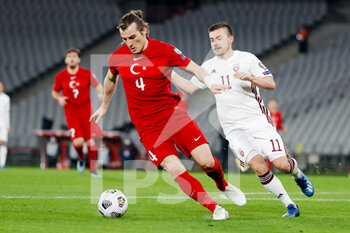 2021-03-30 - Caglar Soyuncu of Turkey and Roberts Savajnieks of Latvia during the 2022 FIFA World Cup, Qualifiers, Group G football match between Turkey and Latvia on March 30, 2021 at Ataturk Olympic Stadium in Istanbul, Turkey - Photo Orange Pictures / DPPI - MONDIALI FIFA 2022, QUALIFICAZIONI, GRUPPO G - TURCHIA VS LETTONIA - FIFA WORLD CUP - SOCCER