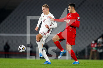 2021-03-30 - Raimonds Krollis of Latvia and Ozan Kabak of Turkey during the 2022 FIFA World Cup, Qualifiers, Group G football match between Turkey and Latvia on March 30, 2021 at Ataturk Olympic Stadium in Istanbul, Turkey - Photo Orange Pictures / DPPI - MONDIALI FIFA 2022, QUALIFICAZIONI, GRUPPO G - TURCHIA VS LETTONIA - FIFA WORLD CUP - SOCCER