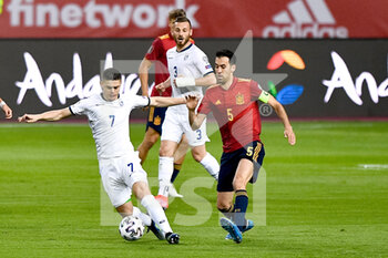 2021-03-31 - Milot Rashica of Kosovo and Sergio Busquets of Spain during the 2022 FIFA World Cup, Qualifiers, Group B football match between Spain and Kosovo on March 31, 2021 at Estadio Olimpico in Seville, Spain - Photo Pablo Morano / Orange Pictures / DPPI - MONDIALI FIFA 2022, QUALIFICAZIONI, GRUPPO B - SPAGNA VS KOSOVO - FIFA WORLD CUP - SOCCER