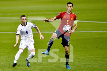 2021-03-31 - Bersant Celina of Kosovo and Sergio Busquets of Spain during the 2022 FIFA World Cup, Qualifiers, Group B football match between Spain and Kosovo on March 31, 2021 at Estadio Olimpico in Seville, Spain - Photo Pablo Morano / Orange Pictures / DPPI - MONDIALI FIFA 2022, QUALIFICAZIONI, GRUPPO B - SPAGNA VS KOSOVO - FIFA WORLD CUP - SOCCER